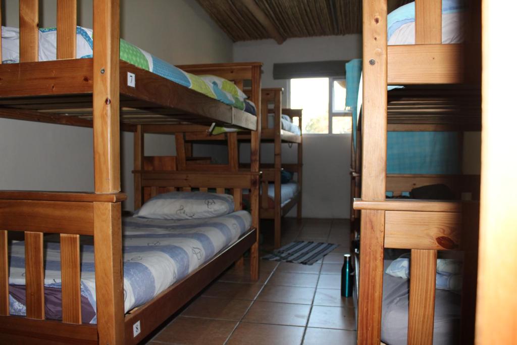 Rustic twin room with warm wood finishes